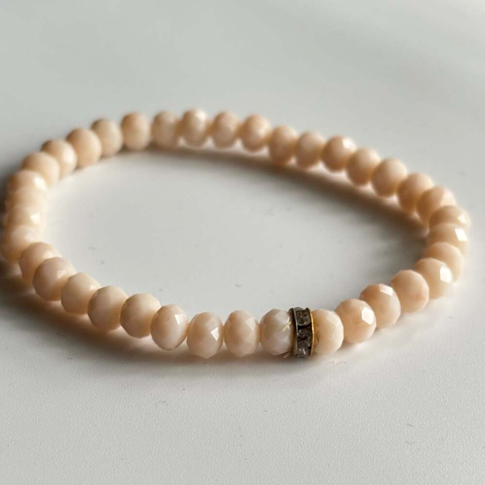 Pale Pink Faceted Bead Stretch Bracelet with Rhinestone Accent